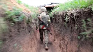Ukrainian troops patrol Donetsk frontline trenches